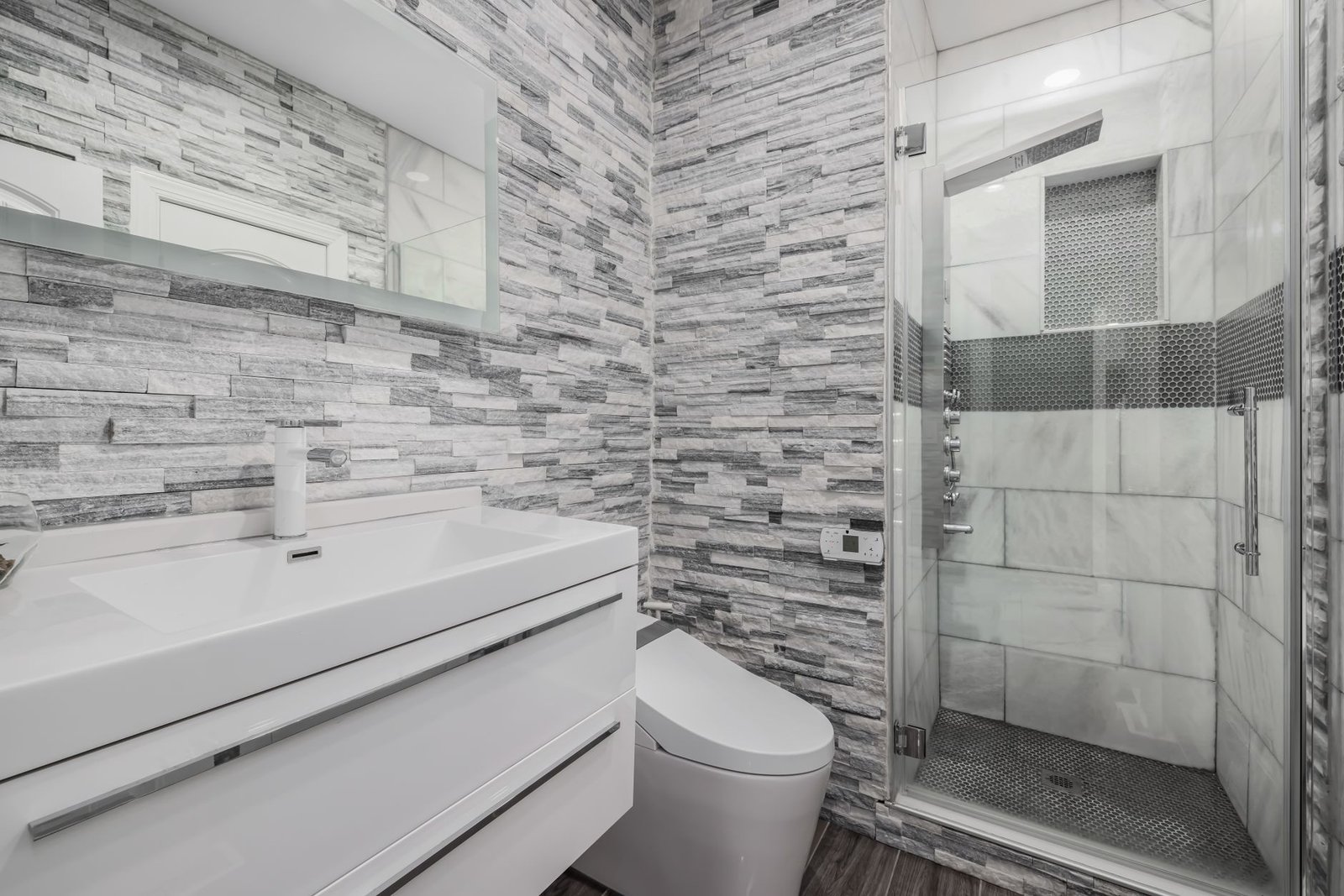 bathroom remodeling in Orlando Florida with modern tile shower and vanity